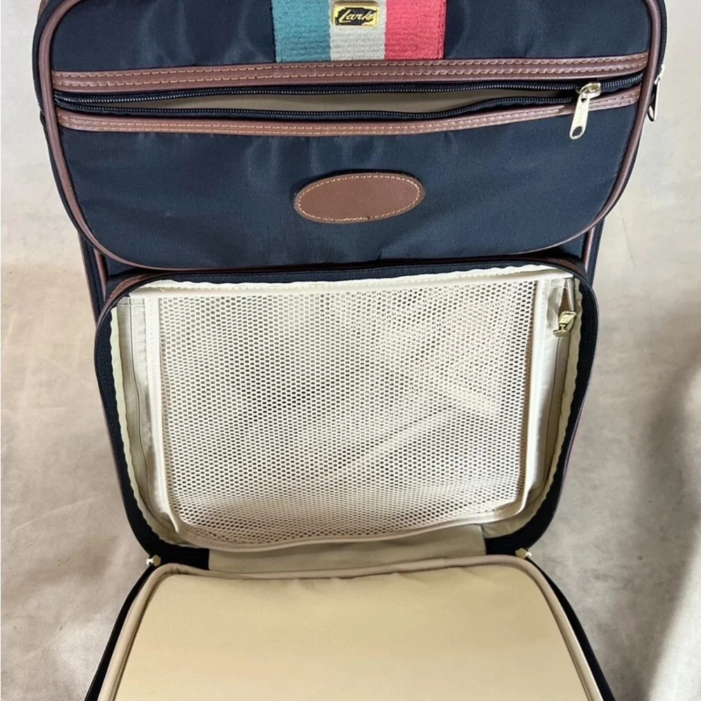 Luxurious Black and Brown Travel Bag with Multicolor Accents